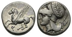 Greek CORINTHIA. Corinth. Circa 345-307 BC. Stater (Silver, 19.70 mm, 8.55 g). Pegasus flying to left, below, koppa. Rev. Head of Athena left, wearing laureate Corinthian helmet with a branch coming o