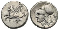 Greek CORINTHIA. Corinth. Circa 350-300 BC. Stater (Silver, 20.50 mm, 8.56 g). Pegasus flying left, Ϙ below. Rev. Helmeted head of Athena left, wearing Corinthian helmet. In front of neck Δ; behind th