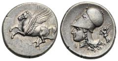 Greek CORINTHIA. Corinth. Circa 350-300 BC. Stater (Silver, 22.10 mm, 8.55 g). Pegasus flying left, Ϙ below. Rev. Helmeted head of Athena left, wearing Corinthian helmet; I below chin, Nike flying lef