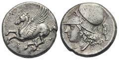 Greek CORINTHIA. Corinth. Circa 345-307 BC. Stater (Silver, 20.66 mm, 8.57 g). Pegasos flying to left, below, Ϙ. Rev. Head of Athena to left, wearing Corinthian helmet and pearl necklace; behind head,