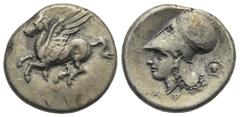 Greek CORINTHIA. Corinth. Circa 345-307 BC. Stater (Silver, 22.07 mm, 8.51 g). Pegasos flying to left, below, Ϙ. Rev. Head of Athena to left, wearing laureate Corinthian helmet; below chin and neck, A