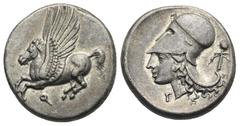 Ancient Greek World Corinthia. Corinth. Circa 375-300 BC. Stater (Silver, 20.64 mm, 8.55 g). Pegasus landing left; koppa below. Rev. Helmeted head of Athena left, helmet decorated with laurel branch; 