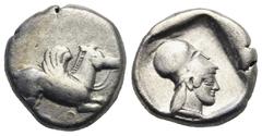 Greek CORINTHIA. Corinth. Circa 500-450 BC. Stater (Silver, 18.16 mm, 8.38 g) Pegasus flying right with curved wings, wearing bridle, koppa below. Rev. Head of Athena right, wearing Corinthian helmet 