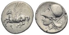 Greek CORINTHIA. Corinth. Circa 375-300 BC. Stater (Silver, 21.00 mm, 8.58 g). Pegasus flying left; Ϙ below. Rev. Head of Athena to left, wearing Corinthian helmet; Γ before neck, thyrsos to right. Ca