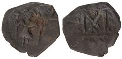 ARAB-BYZANTINE: Two Standing Figures, ca. 636-640s, AE fals (5.13g), N[eapolis] (Nablus), "year 25 ", A-3502N, MIB-X23, overstruck on an undetermined Byzantine follis, of which the reverse capital M s