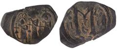 ARAB-BYZANTINE: Three Standing Figures, ca. 640s, AE fals (5.04g), CON (C retrograde), "year 12 ", A-3561, date left of capital M, officina B, VF to EF, R. Struck on half a follis, with the corners sl