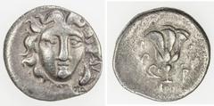 Ancient - Western RHODES: AR drachm (2.26g), 205-188 BC, SNG Keck-589 var, pseudo-Rhodian issue, struck in Caria or Lycia, magistrate Mousaios, head of Helios facing slightly right, countermark of dol