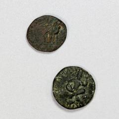 Group Lots - India KUSHAN: LOT of 2 AE tetradrachms, including Vima Takhto: common type but with undeciphered countermark on obverse (Mitch), Fine on VG host; Huvishka: cross-legged king with moon god