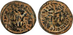 Islamic - Umayyad & Abbasid UMAYYAD: Anonymous, ca. 700-710, AE fals (3.22g), A-153 (probably), overstruck on a Roman billon follis of Licinius (308-324), from which much of the legends are legible: I