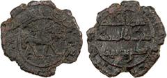 Islamic - Umayyad & Abbasid UMAYYAD: AE fals (1.77g), al-Mubaraka (=Balkh), AH(1)17, A-C204.1, lion in obverse center, date formula around // mint and denomination as sittin bi-dirham ("60 to a dirham