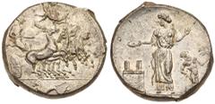 Sicily, Himera. Silver Tetradrachm (17.52 g), ca. 409-407 BC. Signed by the artist Mai… maestro della foglia ("Master of the leaf"). Charioteer, holding reins in both hands, driving fast quadriga righ