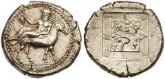 Macedonia, Mende. Silver Tetradrachm (17.15 g), ca. 460-423 BC. Dionysos, inebriated, holding kantharos, reclining left on back of ass standing right. rev. MEN-ΔA-I-ON, vine with five grape bunches. S
