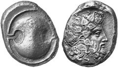 GREEK COINAGE Boeotia Thebes. No.: 201 Schätzwert/Estimate: CHF 500.- Stater c. 410. Boeotian shield. Rev. Head of bearded Dionysus with ivy wreath to r. 12,23 g. SNG Cop. 283. Narrow flan. Very fine.