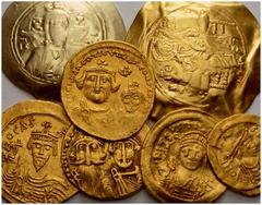 BYZANTINE EMPIRE Lots No.: 351 Schätzwert/Estimation: CHF 650.- Justin II, 565-578. Solidus, Constantinopolis. Phocas. Solidus, Constantinopolis. Tremissis, Constantinopolis. Heraclius and Heraclius C