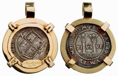 ANCIENT COINAGE ANCIENT COINS AS MODERN JEWELLERY No.: 5679 Schätzwert/Estimate: CHF 400.- Mexican 1 real of Juana and charles set in massive gold frame. 20,87 g. (approx 17 g. gold). Extremely fine.