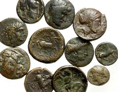 Lot 118.  Lot of Eleven Thessalian Æ's. Includes the following: Krannon. Æ 17mm. Laureate head of Zeus right / Thessalian horseman riding right // Krannon. Æ 17mm. Horseman riding right; K behind / Hy