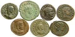 Lot 185.  Lot of Seven Roman Issues. Includes the following: Aurelian. Æ Denarius. Victory left. RIC V 73 // Carausius. Antoninianus. London mint. Pax. RIC V 101 // Constantius I. Æ 1/4 Follis. Siscia
