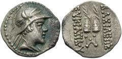 Baktrian Kingdom. Eukratides I. Ca. 171-145 B.C. AR obol (10 mm, 0.67 g, 12 h). Diademed and draped bust right, wearing helmet adorned with bull's horn and ear / [B]AΣIΛEΩ[Σ] EYKPΑTIΔOY, piloi of the 