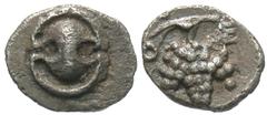 Greek Coins Boiotia, Thebes. Ca. 405-395 B.C. AR tetartemorion (7 mm, 0.18 g). Boiotian shield / Θ-Ε, grape bunch on vine. BCD Boiotia 466; SNG Copenhagen 294-5. Rare. Toned. Good very fine.