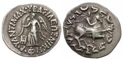 Eastern Greek Coins Baktrian Kingdom. Antimachos II. Ca. 174-165 B.C. AR drachm (18 mm, 2.44 g, 11 h). BAΣIΛEΩΣ NIKHΦOPOY ANTIMAXOY, Nike advancing left, holding palm and fillet; in left field, monogr