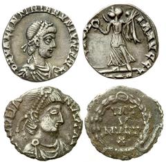 Lot 126.  Lot of Two Late Roman Siliqua. Includes the following: Valentinian II. Trier mint (?). Victory walking left holding wreath and palm. RSC 40a. Attractively toned, choice flan, clipped // Imit