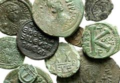 Lot 119.  Lot of Twelve Miscellaneous Byzantine Æ's. Includes the following: Anastasius. Follis. SB 19 // Justinian. Follis (2 examples). SB 158 and 163 // Justinian. Half Follis (2 examples). SB 203 