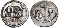Roman Imperatorial, AR denarius, Julius Caesar, military mint traveling with Caesar, ca. 49-48 BC. Crawford-443/1. 4.07 grams Elephant advancing right, trampling on horned serpent / Emblems of the pon