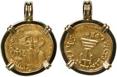 Coin Jewelry Byzantine Empire, AV solidus, Constans II, 641-668 AD, Constantinople mint, mounted head-side out in 18K gold pendant with fixed bail. 7.95 grams total. Crowned and draped bust facing, ho