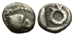 Magnesia AR Tetartemorion, extremely rare Magnesia, Ionia. AR Tetartemorion (5 mm, 0.27 g), before 494 BC. Obv. Archaic head of eagle right. Rev. Wreath or monogram. Cf. Hauck & Aufhäuser 19 (2006), 1