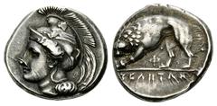 Velia AR Didrachm Velia, Lucania. AR Didrachm (21 mm, 7.52 g), c. 340-330 BC. Obv. Head of Athena left, wearing crested helmet decorated with centauress. Rev. YEΛHTΩN, lion to left, devouring prey; Φ 