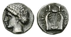Kolophon AR Diobol, c. 375-360 BC Kolophon, Ionia. AR Diobol (10 mm, 1.01 g), c. 375-360 BC. Obv. Laureate head of Apollo left. Rev: KOΛΟΦΩ ΠΟΣΙΣ, lyre. SNG Cop. 142. Dark toning. Good very fine.