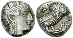 Qataban AR Tetradrachm Qataban , southern Arabia. Unkown ruler(s). AR Tetradrachm (22 mm, 16.62 g), c. 350-300 BC. Imitating Athens. Obv. Helmeted head of Athena right; on neck guard, monogram of y an