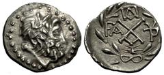 Elis (under the Achaean League) AR Hemidrachm, ex BCD, very crude Elis , under the Achaean League. AR Hemidrachm (15-17 mm, 2.32 g), c. mid 1st Century BC. Obv. Laureate head of Zeus right. Rev. Centr