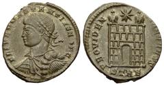 Constantius II. AE3, campgate reverse, Trier Constantius II. (324-361 AD). AE3 (17-19 mm, 3.37 g), Treveri (Trier), c. 327-8 AD. Obv. FL IVL CONSTANTIVS IVN NOB C, laureate, draped and cuirassed bust 