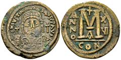 Ancient Coins Iustinianus AE Follis, Constantinopolis Iustinianus I (527-565 AD). AE Follis (34 mm, 19.68 g), Constantinopolis. Obv. DN IVSTINIANVS PP AVG, bust facing. Rev. Large M / ANNO XVI / CON. 