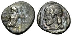 Kleitor AR Hemidrachm, c. 480-475 BC Arkadia, Arkadian League. Kleitor. AR Hemidrachm (14 mm, 2.83 g), c. 480-475 BC. Obv. Zeus Lykaios seated left on low throne, holding long sceptre with his left ha