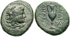 Lydia, Sardes. 200-133 B.C. Æ 16 (16 mm, 3.50 g, 1 h). Head of youthful Herakles right, wearing lion's skin around neck / ΣAPΔIANΩN, kantharos, monogram to lower right. BMC 45; SNG Cop 469. VF, oval f
