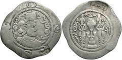 Hephthalites. Uncertain ruler. 7th century A.D. AR drachm (32 mm, 3.67 g, 3 h). Copying Balkh mint, Dated RY 13. Crowned bust of Hormizd IV right; c/m: human head left / Fire altar, attendants flankin