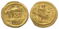 BYZANTINE EMPIRE. Justin II, 565-578 AD. Gold Solidus (4.47 gm) of Constantinople. Crowned bust facing / Constantinopolis seated. S.345. XF.