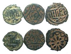[Islamic]. Lot of 3 Islamic Bronze Coins. Two Umayyad, one Mamluk. Different types, unresearched. F-VF. All group lots are sold as-is, returns not accepted. The coins shown are the exact coins you wil