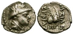 BAKTRIAN KINGDOM. Eukratides, 171-135 BC. AR Obol (0.60 gm). Diademed draped bust / Caps of the Dioskouri. SNG.ANS.488. Toned VF.
