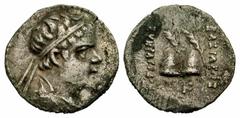 BAKTRIAN KINGDOM. Eukratides, 171-145 BC. AR Obol (0.63 gm). Diademed draped bust / Caps of the Dioskouri. SNG.ANS.443. Toned VF.