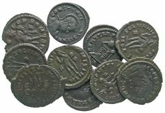 [Roman Imperial]. Lot of 14 Roman Bronze Coins. Including late Roman, Roman provincials, and a fourree of Herennia Etruscilla. F-VF. All group lots are sold as-is, returns not accepted. The coins show