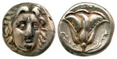 Islands off Caria, Rhodos. Rhodes. Ca. 304-275 B.C. AR didrachm (18.49 mm, 6.65 g, 11 h). Radiate head of Helios facing slightly right / Rose, with bud to either side; grapes in left field, E to left.