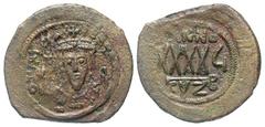 Byzantine BYZANTINE EMPIRE. Phocas, 602-610 AD. AE Follis (10.80 gm) of Kyzikos, yr. 5 B. Crowned bust facing / Large XXXX. S.665. VF, brown patina.