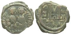 Byzantine BYZANTINE EMPIRE. Justin II, 565-578 AD. AE Follis (12.78 gm) of Constantinople, yr. 4, off. A. Justin and Sophia enthroned facing / Large M, Christogram above. S.360. aVF, olive brown patin