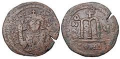 Byzantine BYZANTINE EMPIRE. Tiberius II, Constantine, 578-582 AD. AE Follis (14.78 gm) of Constantinople, yr.4, off, D. Crowned bust facing / Large M. S.430. aVF, brown patina.