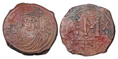 Byzantine BYZANTINE EMPIRE. Maurice Tiberius, 582-602 AD. AE Follis (11.52 gm) of Theoupolis (Antioch), yr. 11, off.G. Crowned facing bust / Large M. S.533. VF, brown patina, porosity.