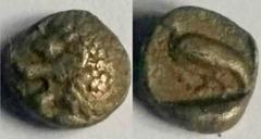 Greek Caria, Uncertain mint. Ca. 420-390 B.C. AR tetartemorion (5.9 mm, .22 g, 12 h). Head lion left, head right / Bird standing left, all within incuse square. SNG Keckman 927. Good VF. Scarce. Ex Ha