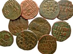 Group Lots [Byzantine]. Lot of 10 Byzantine Bronze Coins. Group lot of 10 Byzantine follis Average grade Fair-Fine. All group lots are sold as-is, returns not accepted. The coins shown are the exact c